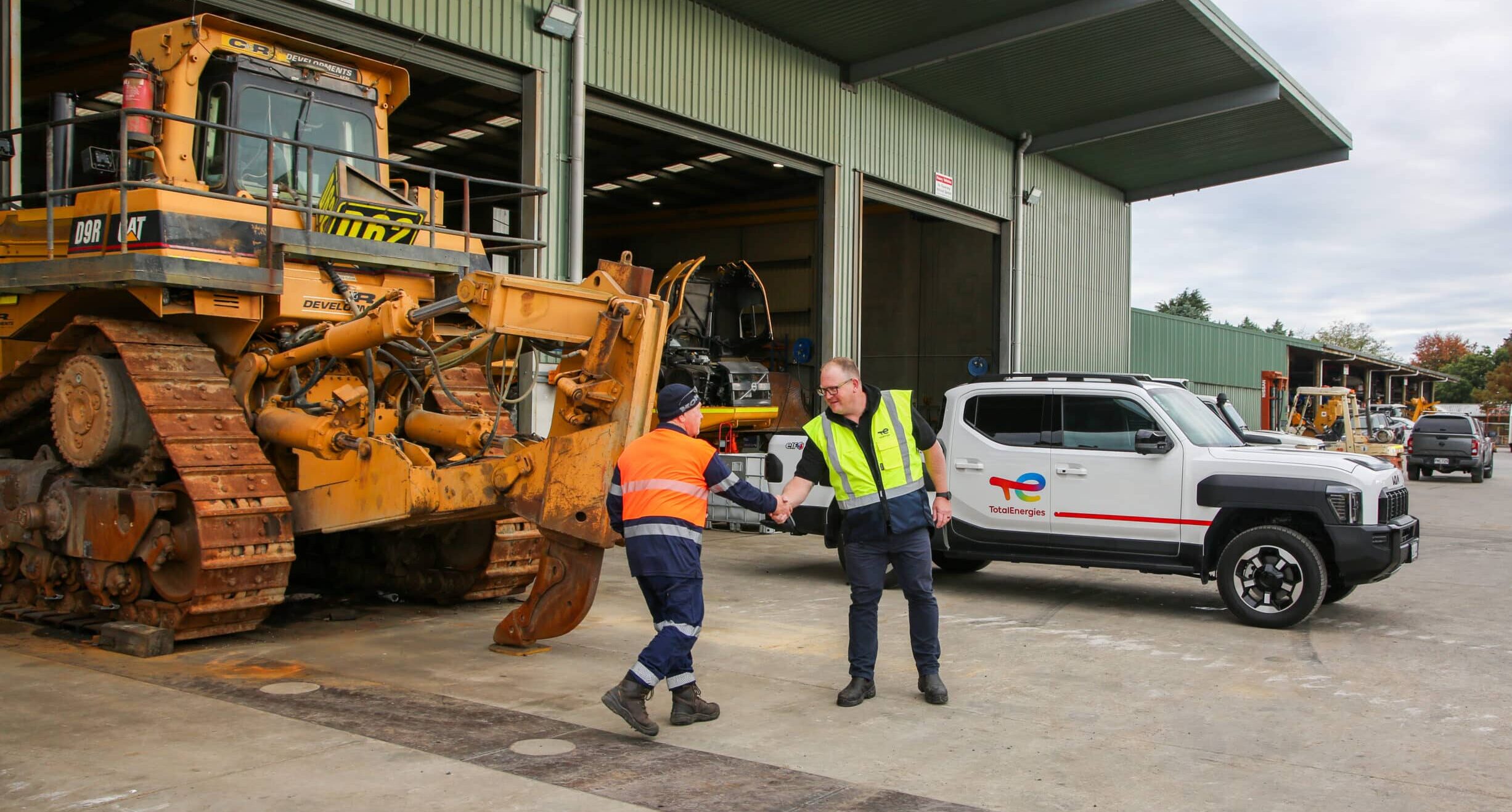 TotalEnergies & customer shaking hands